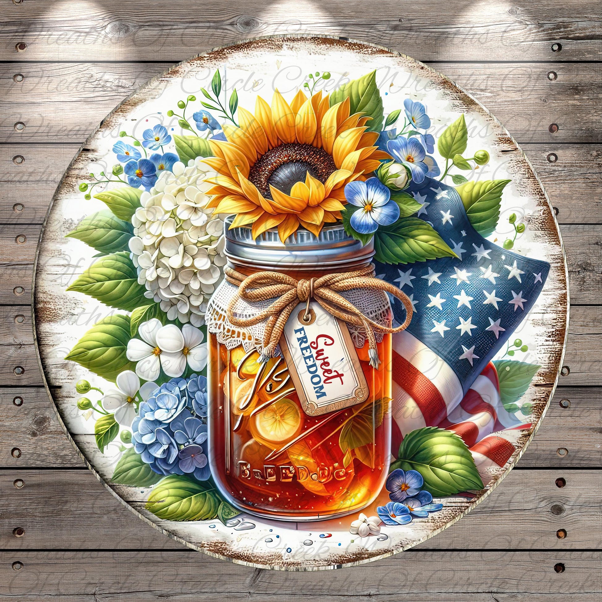 A round, wooden plate with a jar of honey surrounded by flowers, including a sunflower, hydrangeas, and bluebells. The jar has a "Sweet Freedom" label.