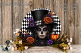 a decorative wreath with a sugar skull design, surrounded by colorful flowers and a pumpkin. The wreath is set against a wooden background.