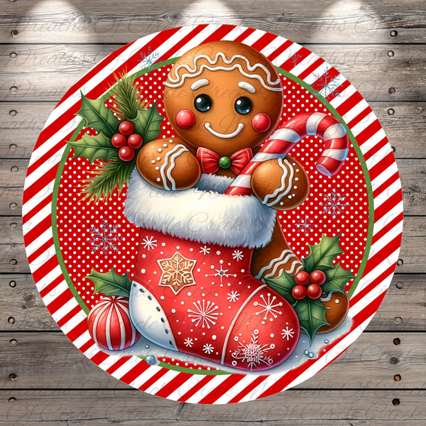 A gingerbread man wearing a red and white striped stocking, holding a candy cane, and surrounded by holly leaves and berries, all set against a red and white striped background.
