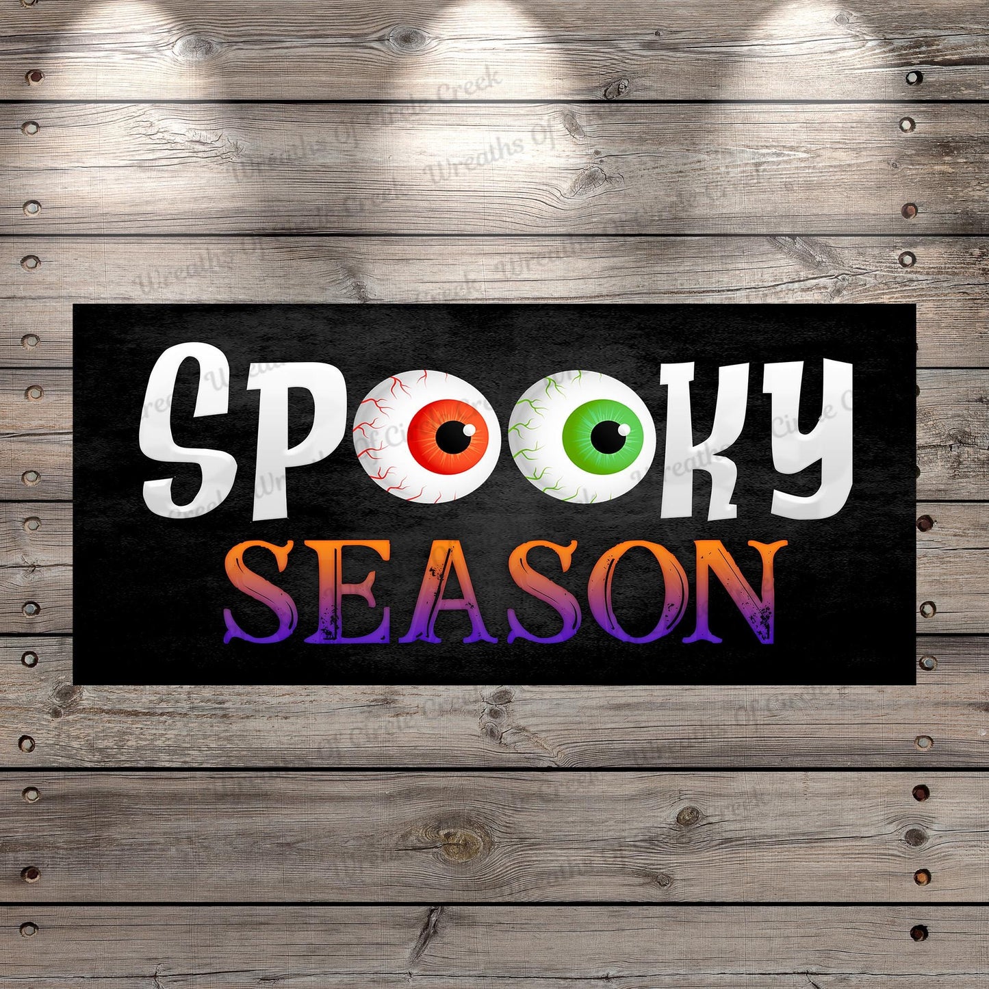 a sign that says spooky season on it