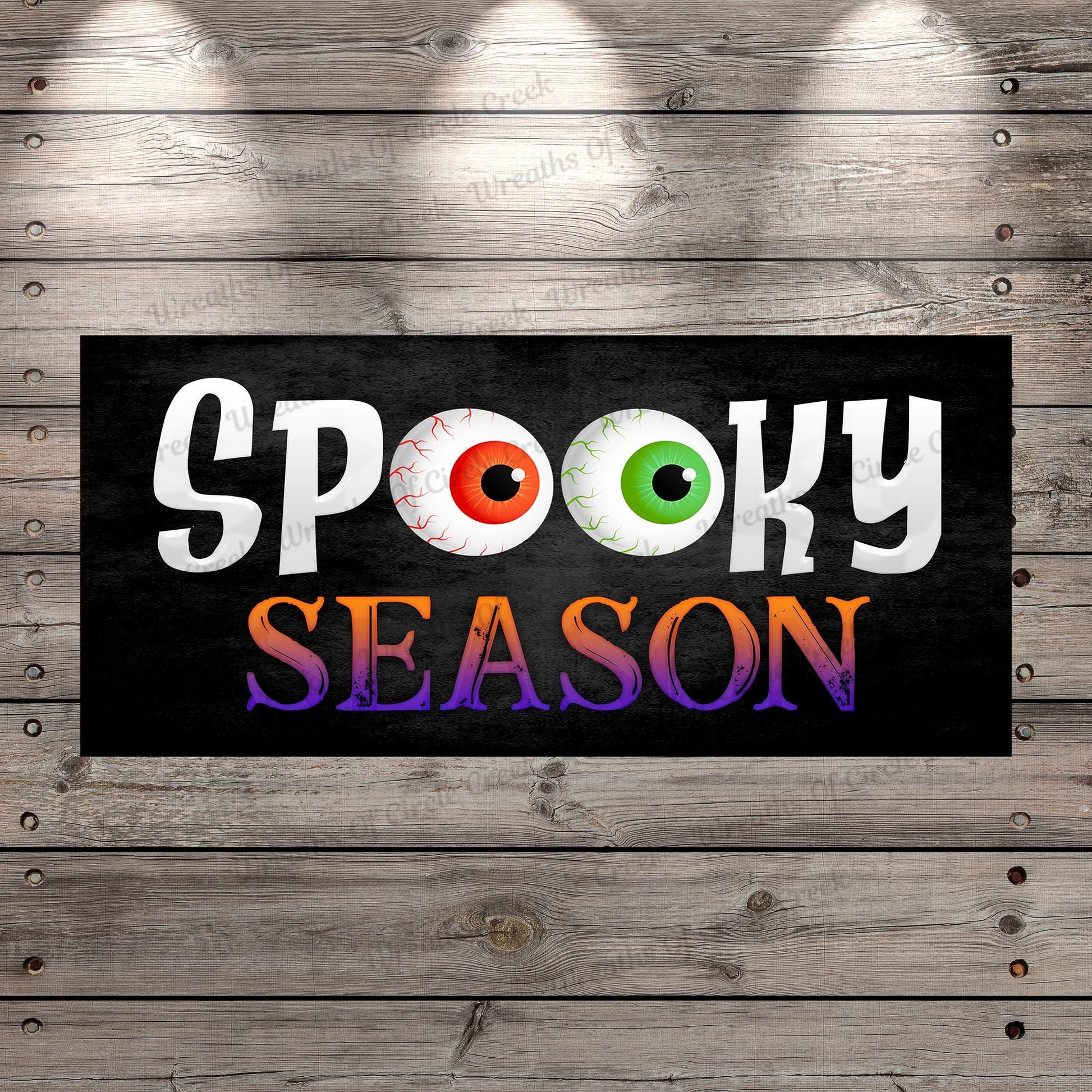 a sign that says spooky season on it