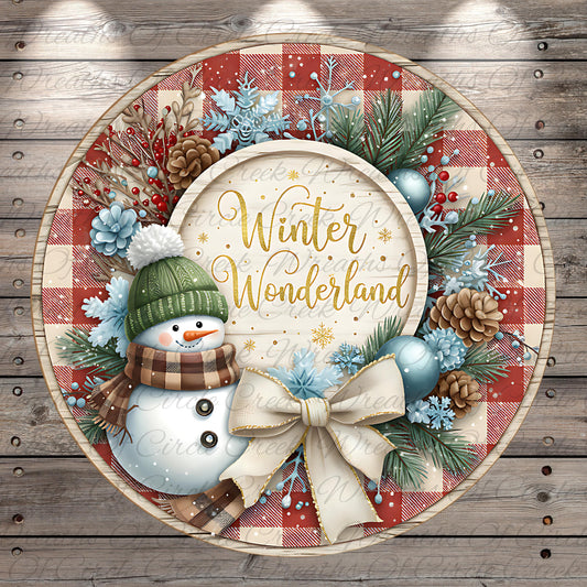 A snowman wearing a green hat and scarf, surrounded by a wreath of pine cones, pine branches, and other winter decorations, with the text "Winter Wonderland" displayed on the wreath.