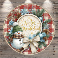 A snowman wearing a green hat and scarf, surrounded by a wreath of pine cones, pine branches, and other winter decorations, with the text &quot;Winter Wonderland&quot; displayed on the wreath.