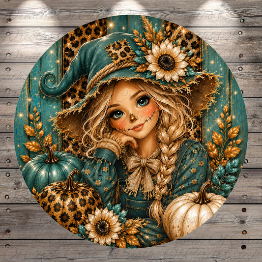 A round illustration depicting a young girl with blonde hair, wearing a green witch's hat and surrounded by autumn-themed elements such as pumpkins, flowers, and leaves.