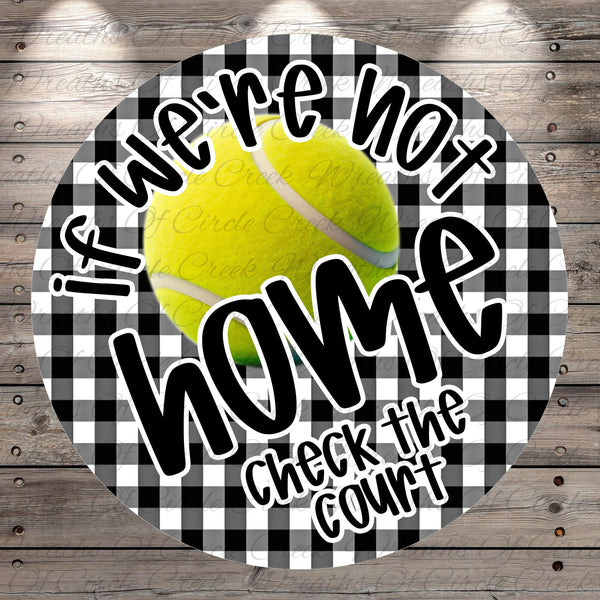 A tennis ball is displayed against a black and white checkered background, accompanied by the text "If we're not home, check the court" in a playful and humorous manner.
