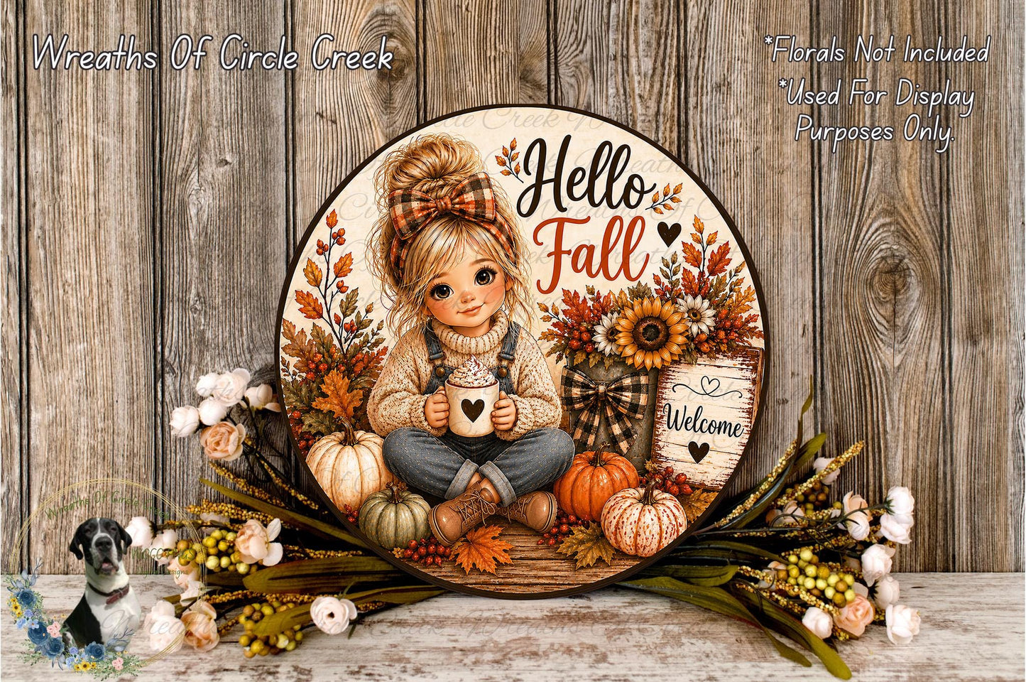 A decorative wreath featuring a young girl sitting amidst autumn foliage, flowers, and pumpkins, with the text "Hello Fall" and "Welcome" displayed.