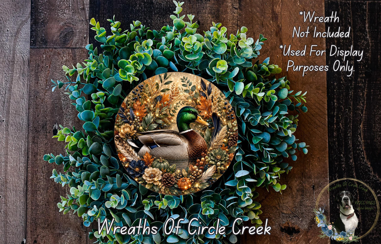 A wreath made of green leaves and flowers, with a large image of a duck surrounded by the foliage.