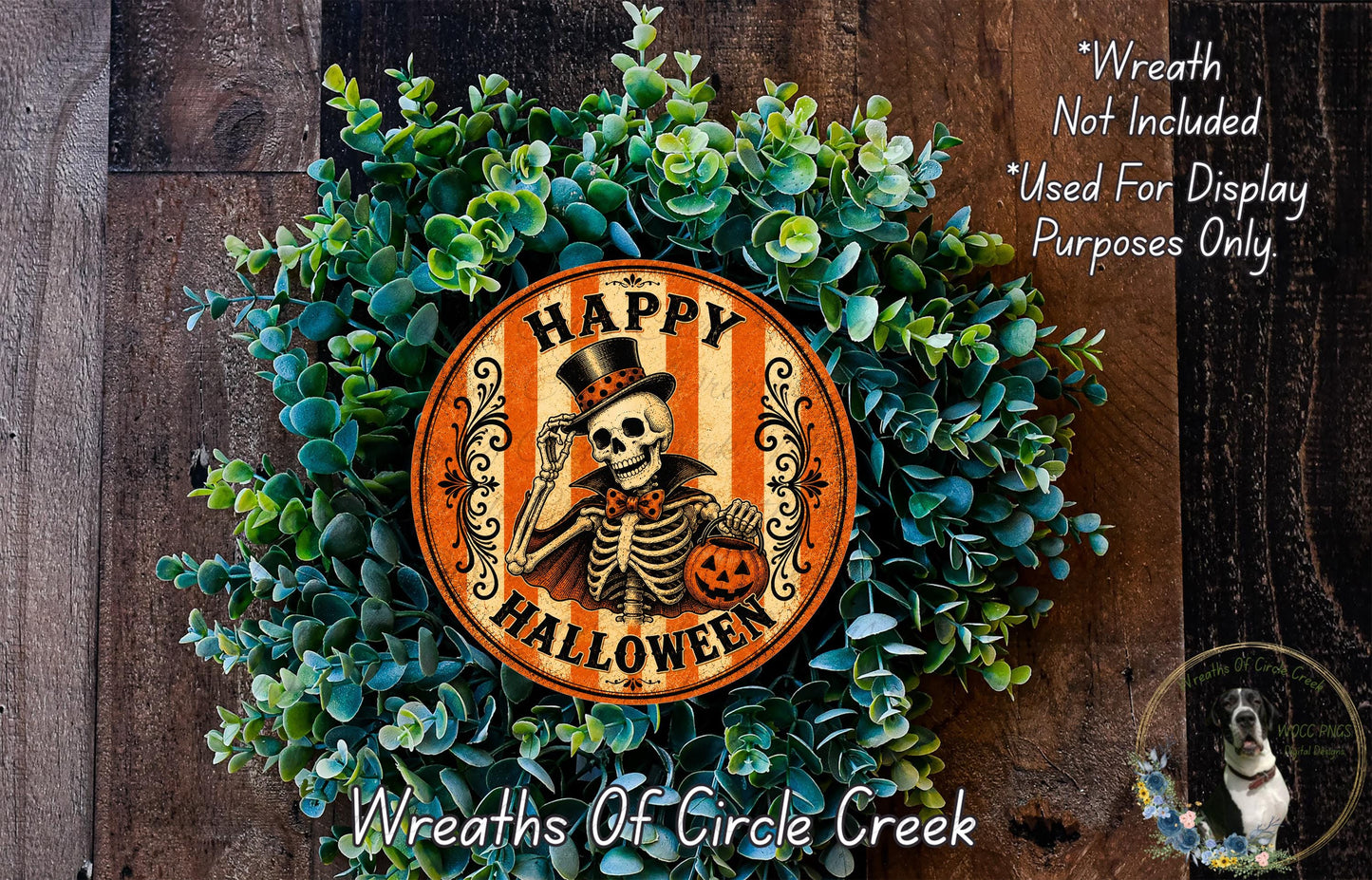 a Halloween wreath with a skeleton wearing a top hat and holding a jack-o-lantern. The wreath is surrounded by green foliage and has a circular sign with the text "Happy Halloween" on it.