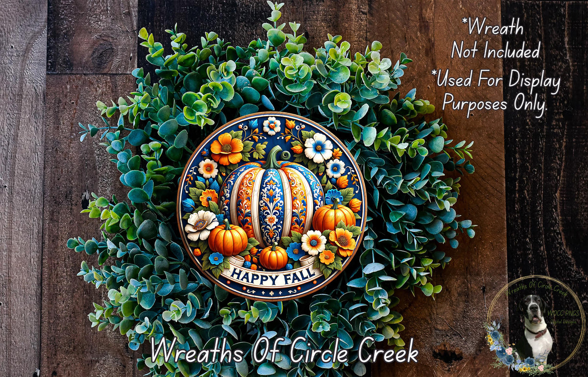 A wreath made of various fall-themed elements, including a pumpkin, flowers, and greenery, with the text "Happy Fall" displayed on it.