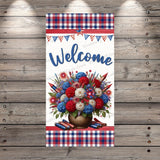 a welcome sign hanging on a wooden wall