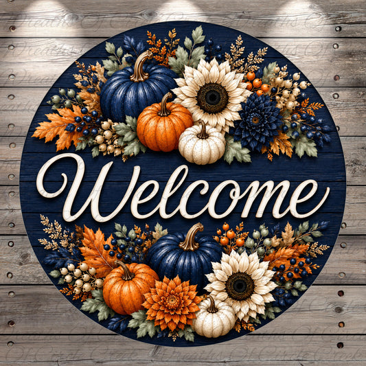 A circular welcome sign with a blue background, surrounded by a variety of autumn-themed decorations including pumpkins, sunflowers, berries, and leaves.