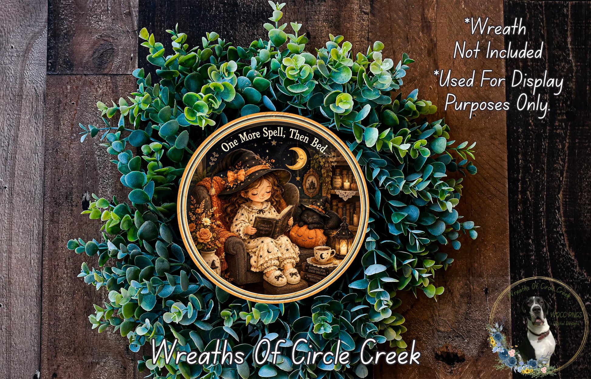A wreath with a girl reading a book, surrounded by green foliage, and a dog in the corner.