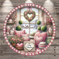 A cozy and charming interior scene with a large window overlooking a snowy landscape. The room is decorated with pink and white floral accents, and there are various knick-knacks and ornaments throughout the space. A heart-shaped wreath hangs on the wall, and a sign that reads "Cozy Valentine" is displayed. The overall atmosphere is warm and inviting, with a touch of wintery charm.
