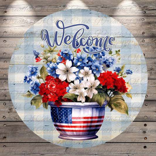 A round wooden sign with a vase of red, white, and blue flowers, along with the text "Welcome" written on it.