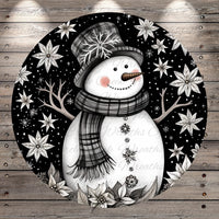 A whimsical snowman with a hat and scarf, surrounded by snowflakes and flowers, is depicted in the image.