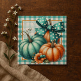 A decorative collage featuring a green and orange pumpkin with a polka dot bow, surrounded by white flowers and a beige cloth on a wooden surface.
