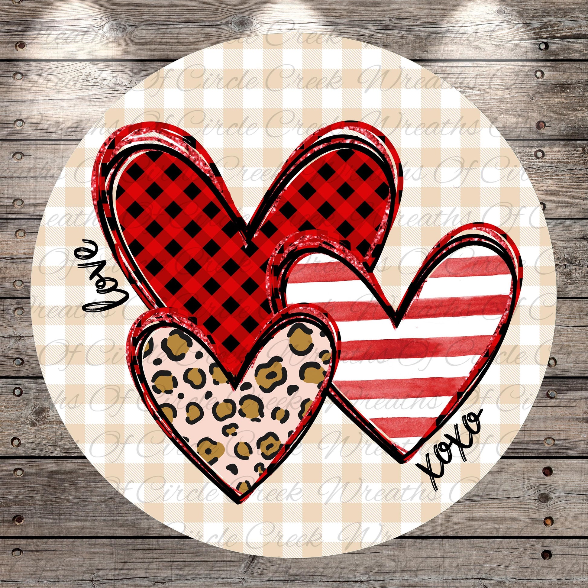 A circular design featuring three heart-shaped illustrations with different patterns and colors, including red and black plaid, leopard print, and stripes.