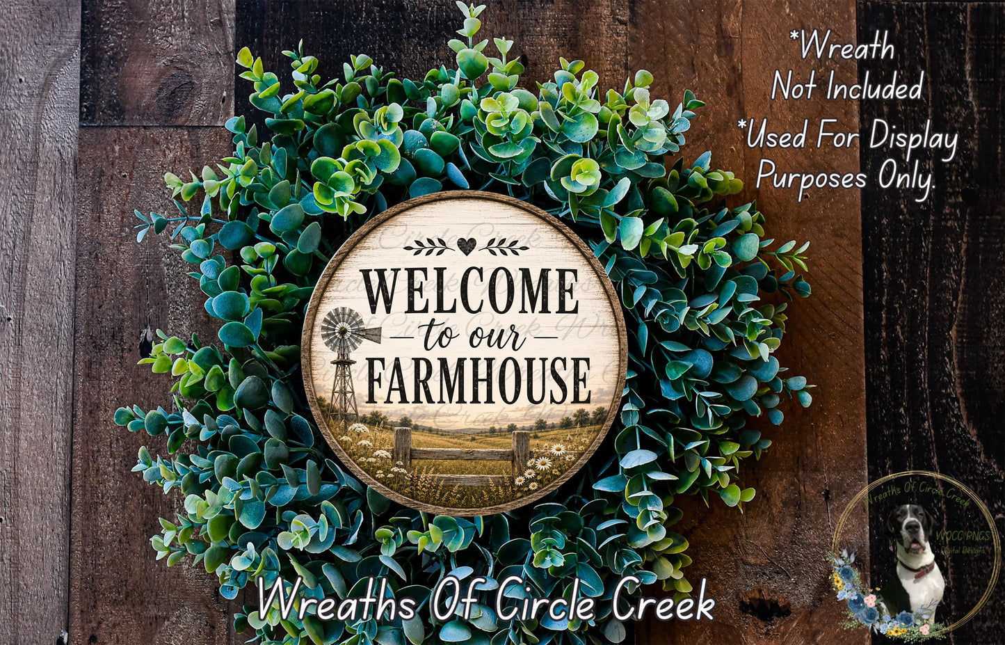 a wreath with a wooden sign that says "Welcome to our Farmhouse" surrounded by green foliage.