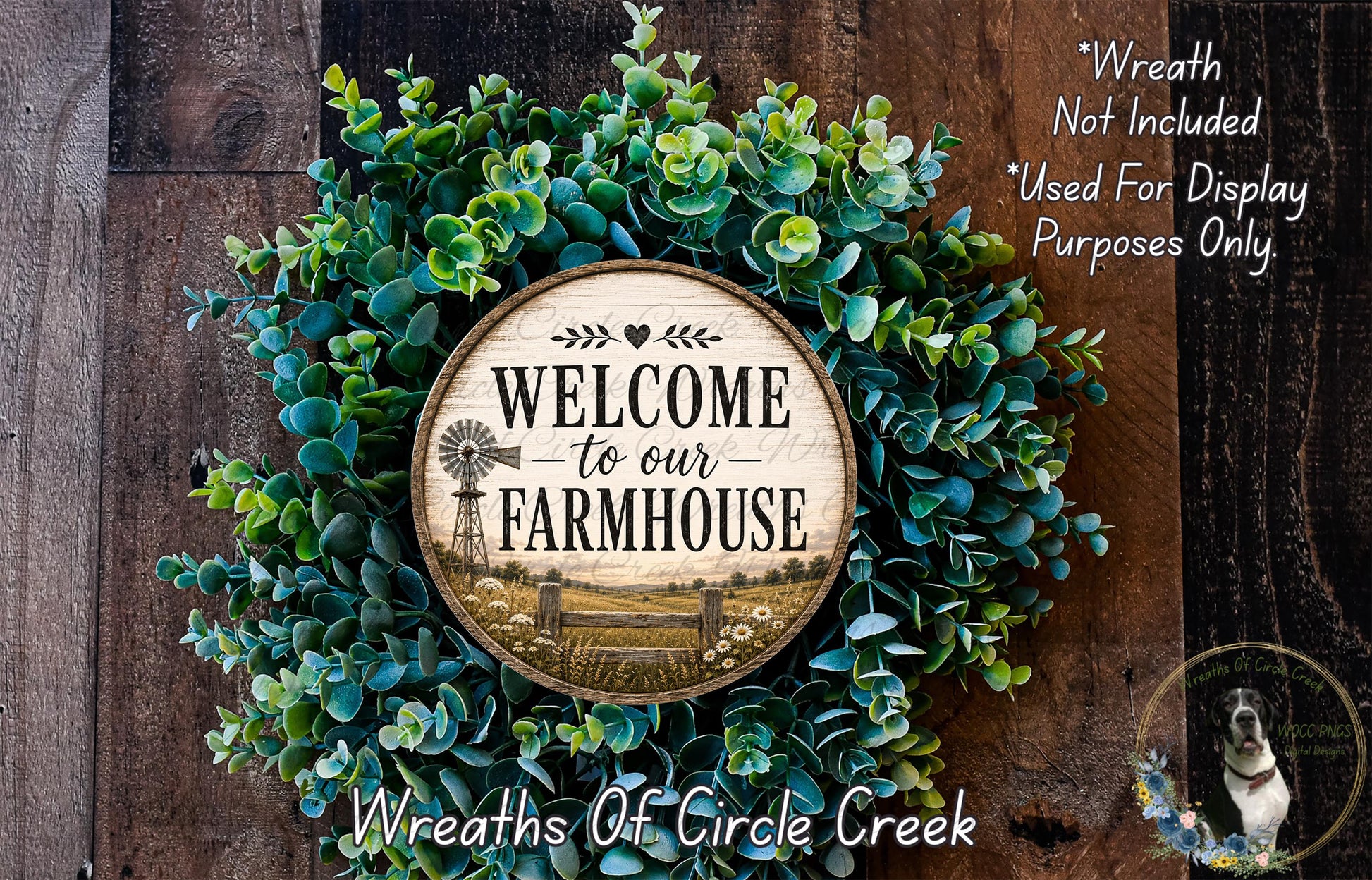 a wreath with a wooden sign that says "Welcome to our Farmhouse" surrounded by green foliage.