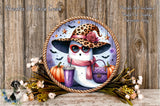 A whimsical Halloween-themed wreath featuring a ghost wearing a leopard print hat, sunglasses, and carrying a purple purse, surrounded by pumpkins and flowers.