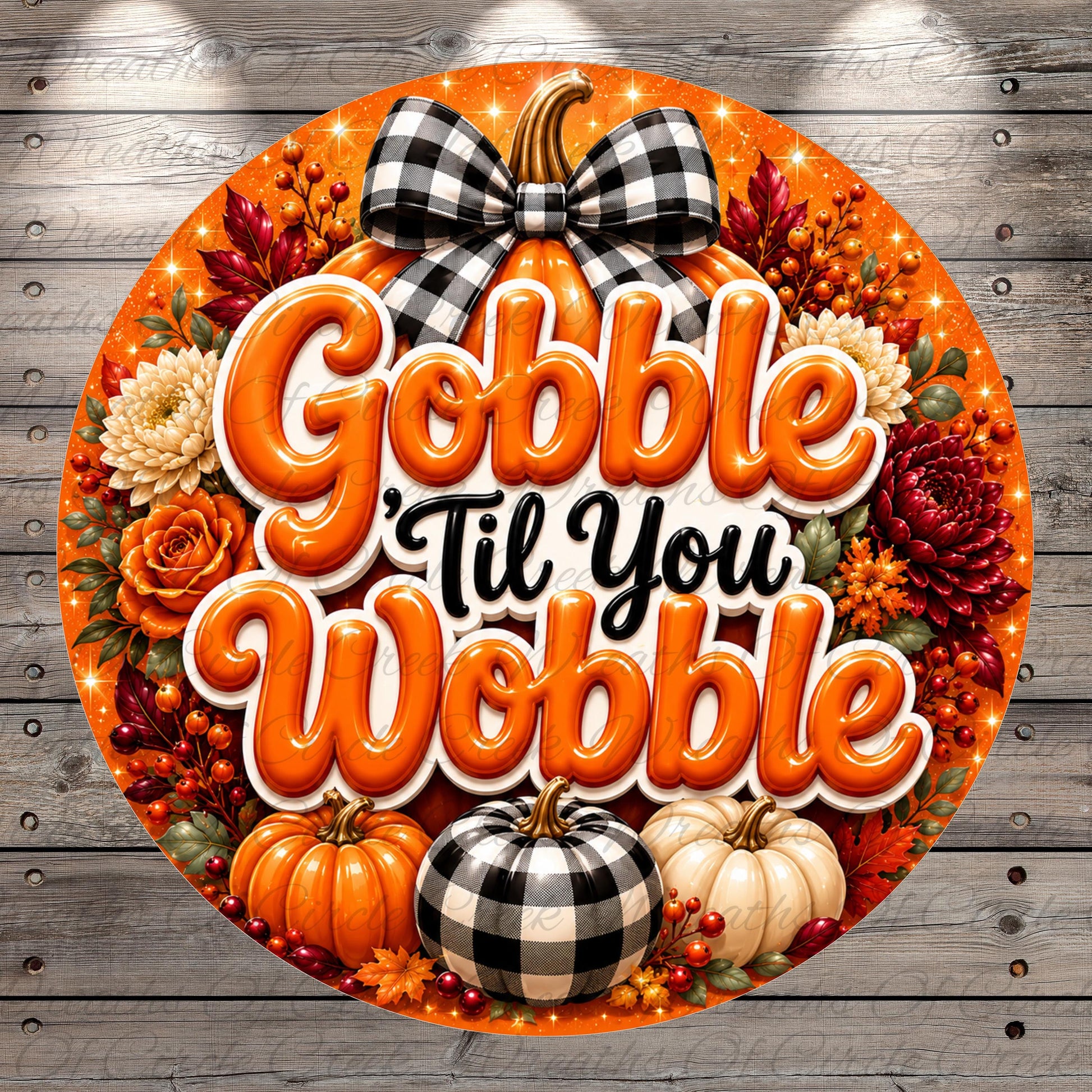 A circular sign with the text "Gobble 'Til You Wobble" surrounded by autumn-themed decorations such as pumpkins, flowers, and a bow.