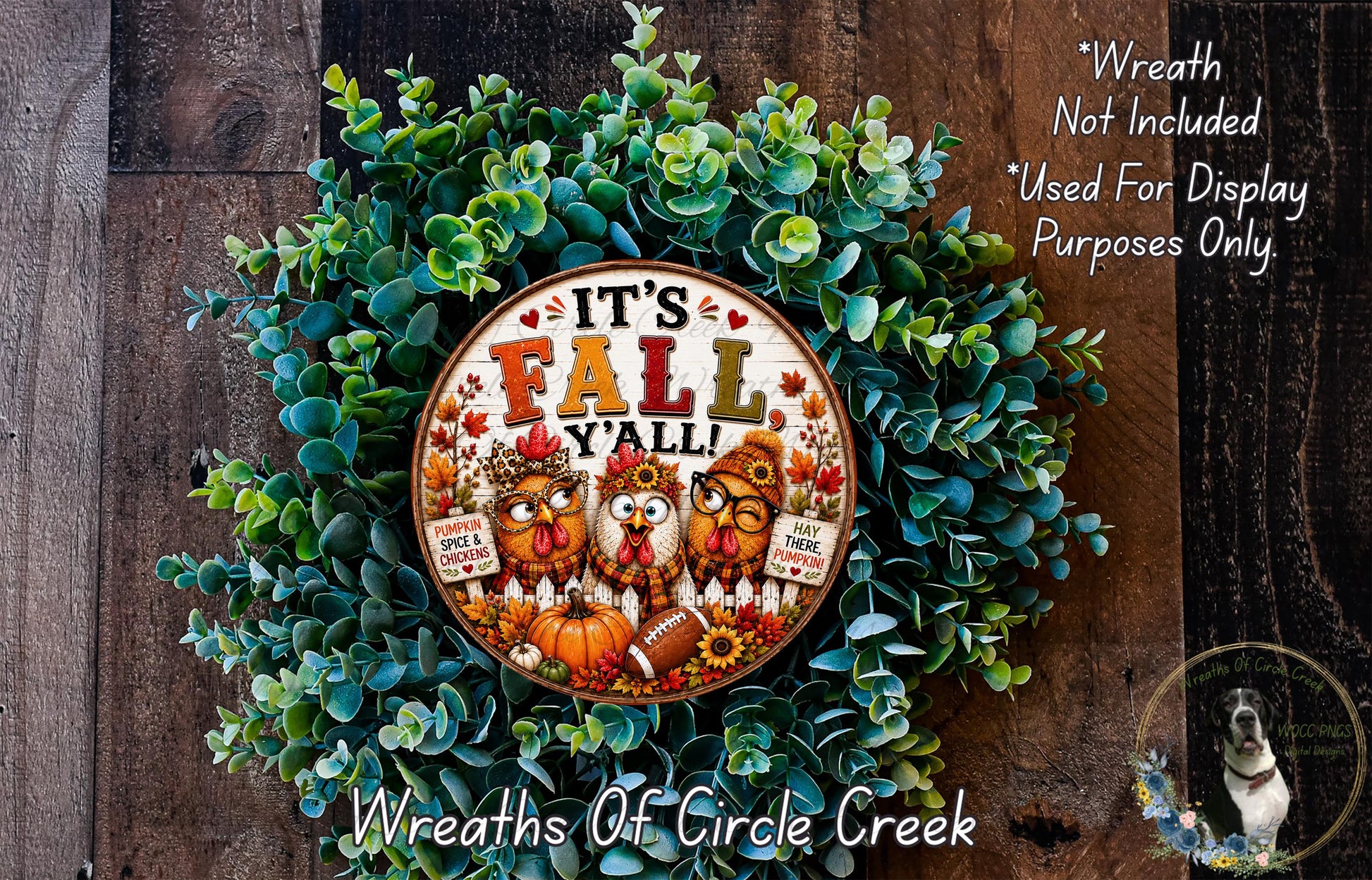 A wreath made of green leaves and featuring a circular sign with the text "It's Fall Y'all" surrounded by three cartoon owls and a dog.