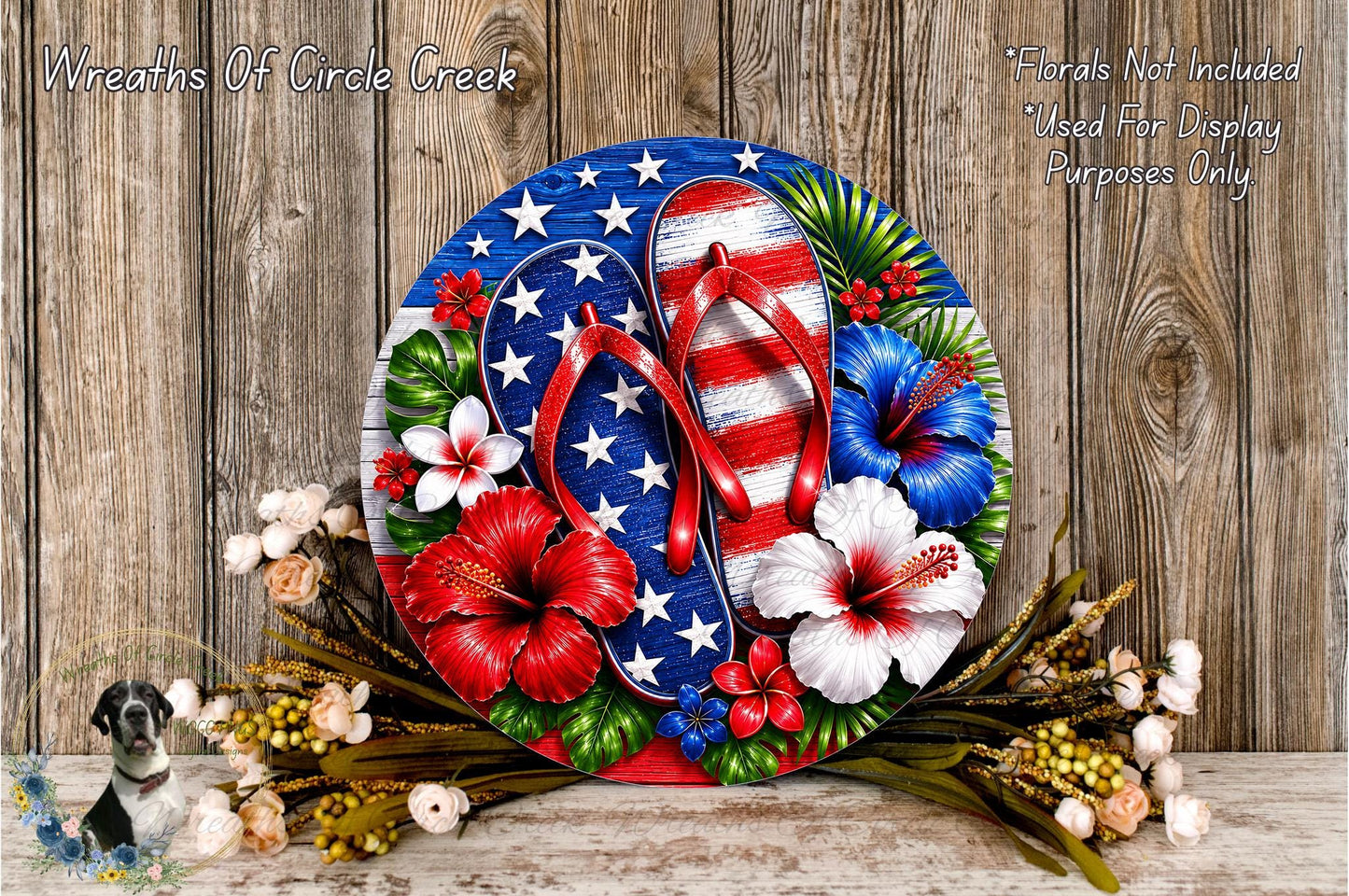 a vibrant and colorful wreath made of a circular frame with a red, white, and blue design, adorned with flowers and leaves.