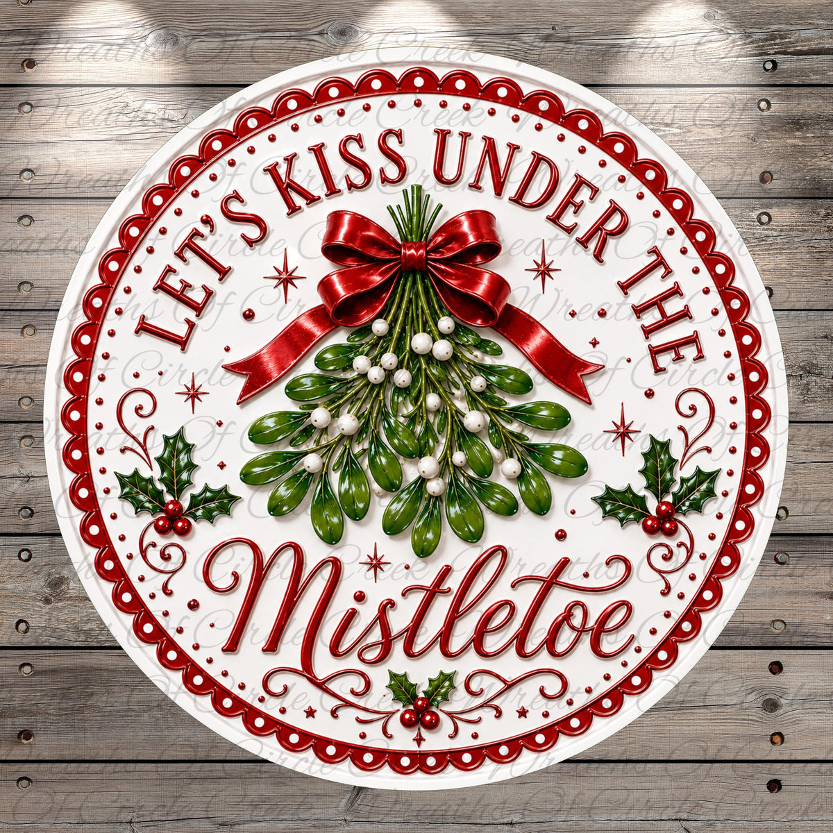 A decorative circular sign with the text "Let's Kiss Under The Mistletoe" and a decorative ribbon, surrounded by a festive design with holly leaves, berries, and pine cones.