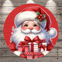 Santa Claus holding a pile of presents against a red background with white polka dots.