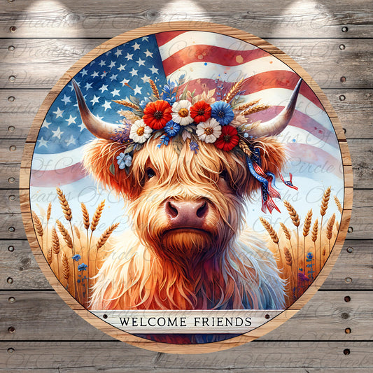 A close-up of a Highland cow wearing a flower crown, with an American flag in the background.