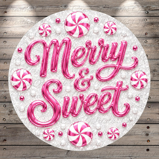A circular arrangement of pink and white candy pieces, with the text "Merry & Sweet" prominently displayed in the center.