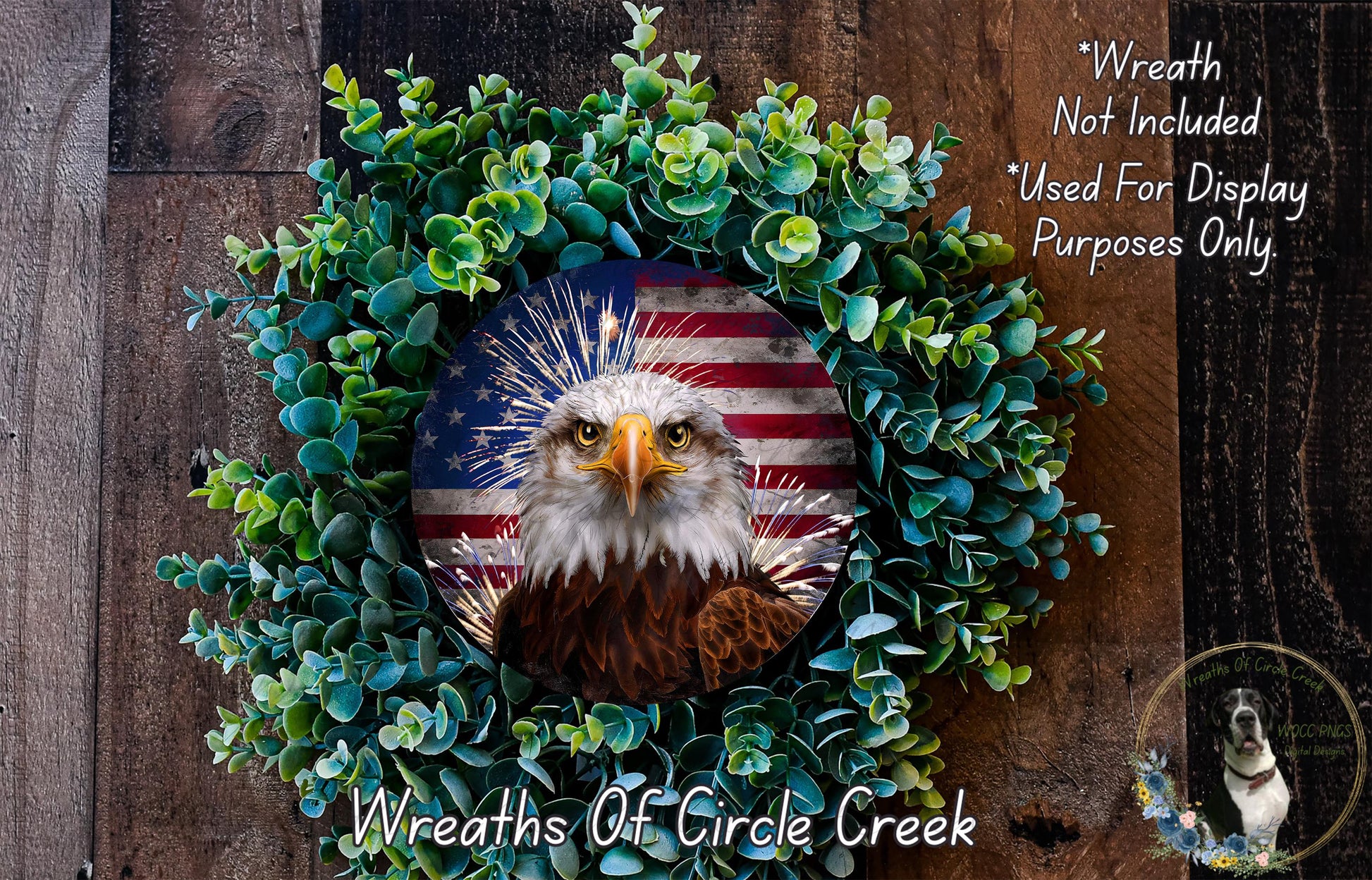 A wreath featuring a bald eagle in the center, surrounded by green foliage and an American flag design.