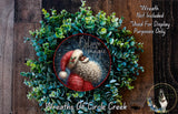 A wreath made of green leaves and a Santa Claus figure, with the text "Believe in the magic" written on it.