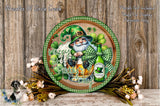 A decorative plate featuring a smiling leprechaun holding a mug of beer, surrounded by flowers and a green and white checkered border.