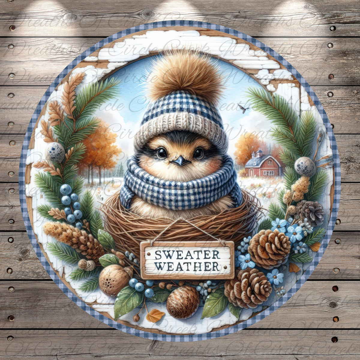 A small bird wearing a blue and white hat and scarf sits in a nest surrounded by pine cones, pine needles, and other winter-themed decorations. The bird is wearing a sign that says " sweater weather".