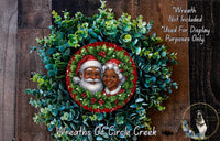 A wreath featuring Santa Claus and Grandma on a Christmas tree, with a text overlay that reads "Wreath Not Included * Used For Display Purposes Only" and "Wreaths of Circle Creek".