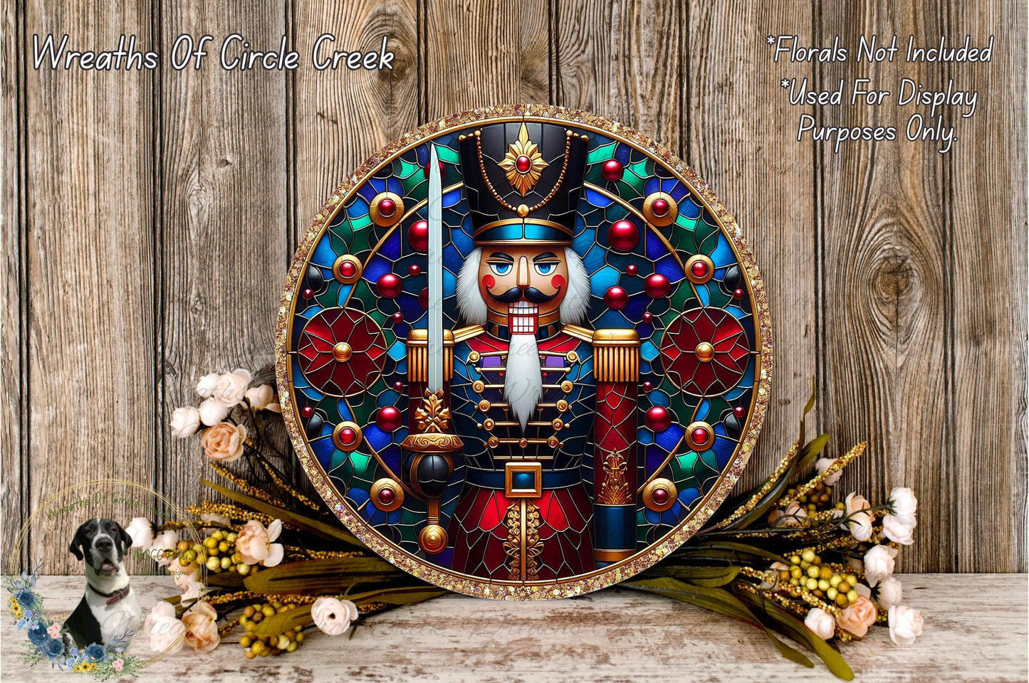 a decorative nutcracker figure surrounded by a colorful, intricate design of stained glass elements. The nutcracker is adorned with a hat, a sword, and a nutcracker shell, creating a festive and whimsical display. The nutcracker is placed on a wooden surface, with a floral arrangement of flowers and greenery surrounding it. The nutcracker is the central focus of the image, drawing the viewer's attention to its detailed design and vibrant colors.