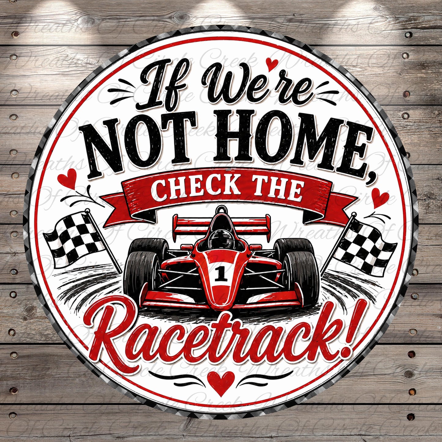 a racing car with a racing-themed design, accompanied by a humorous message that reads "If We're Not Home, Check the Racetrack!"