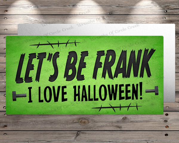 a green sign that says let&#39;s be frank i love halloween