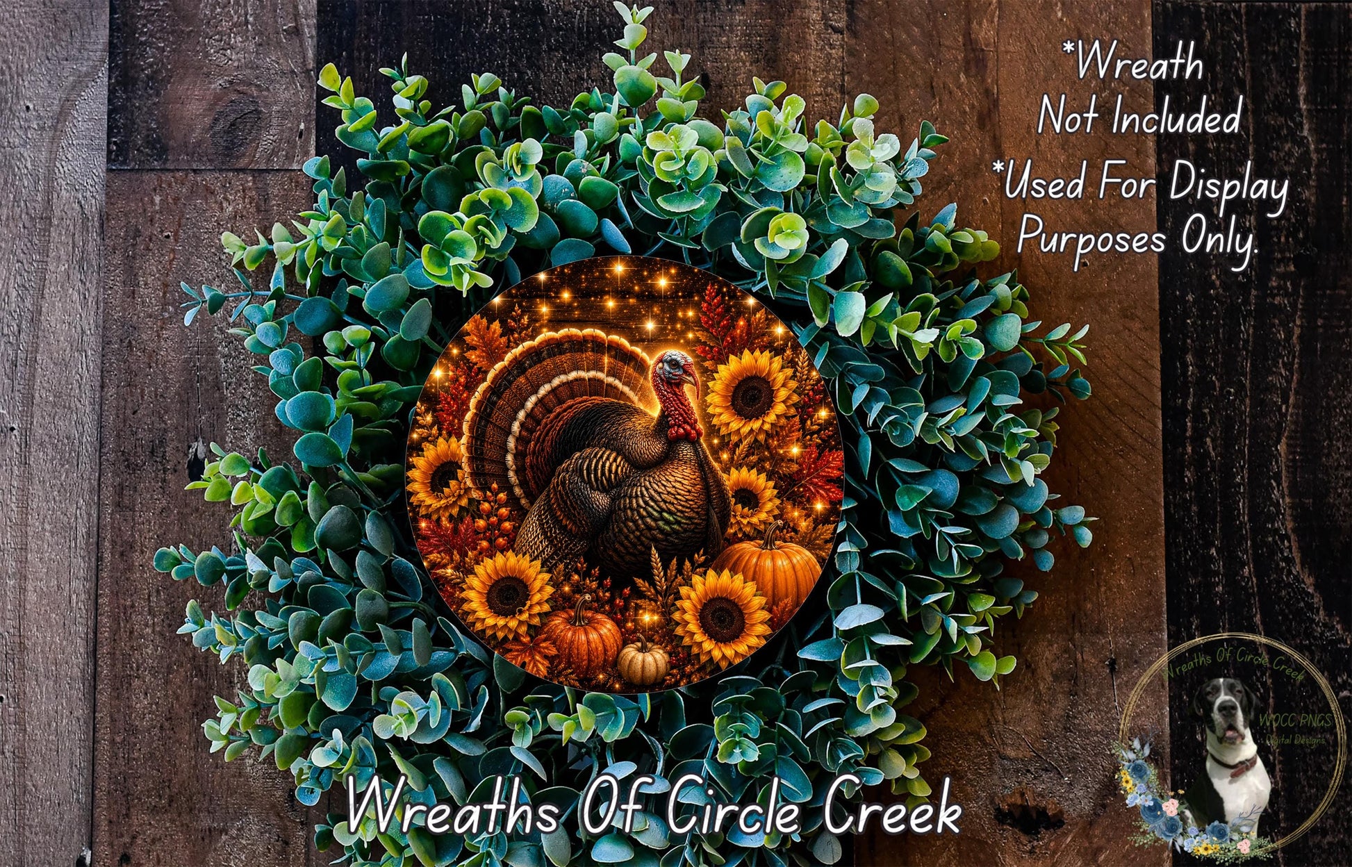 A wreath made of various autumn-themed elements, including a turkey, sunflowers, pumpkins, and greenery, is displayed on a wooden surface.