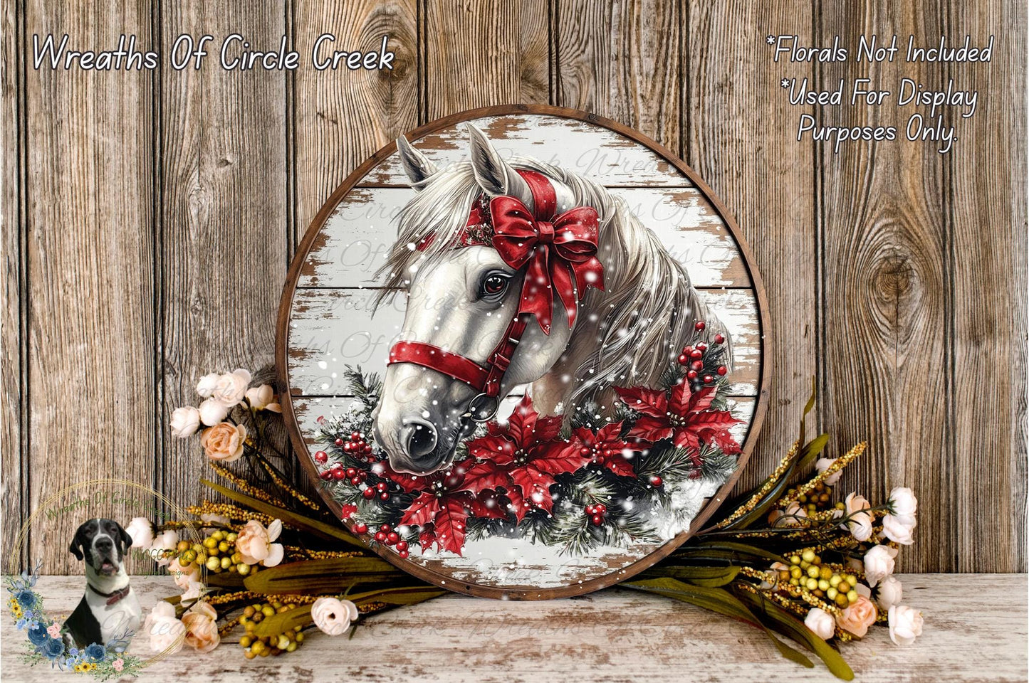 A round wooden plaque with a white horse's head and a red bow, surrounded by red poinsettia flowers and greenery, set against a rustic wooden background.