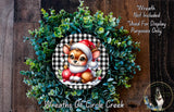 A wreath featuring a cartoon deer wearing a Santa hat, surrounded by green foliage.