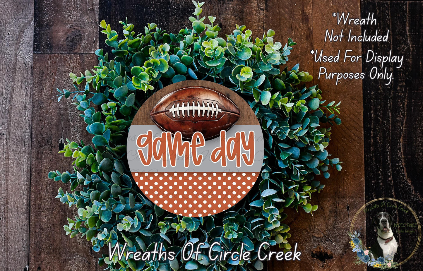 a wreath made of green foliage and a football, with the text "game day" prominently displayed on the wreath.