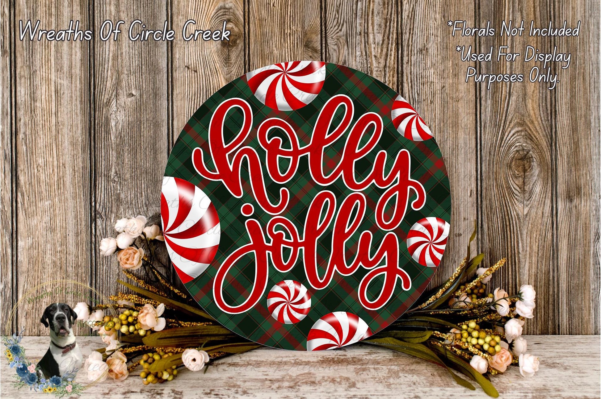 A festive wreath with the text "Holly Jolly" in red and white cursive lettering, surrounded by red and white striped candy canes and a floral arrangement.