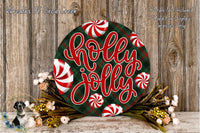 A festive wreath with the text &quot;Holly Jolly&quot; in red and white cursive lettering, surrounded by red and white striped candy canes and a floral arrangement.