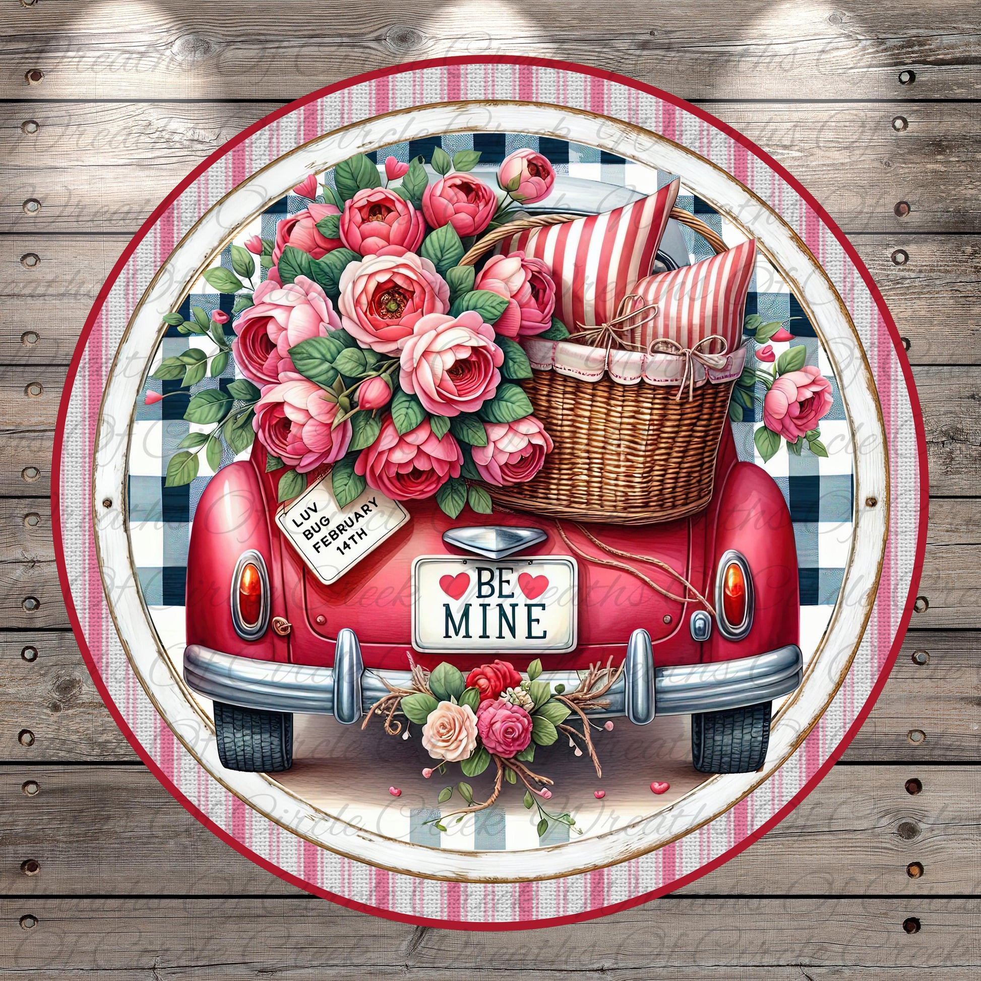 A vintage red car with a basket filled with pink roses, surrounded by a floral arrangement and a "Be Mine" sign.