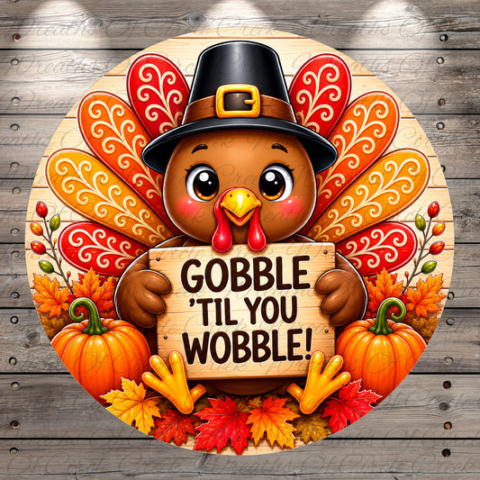 A cheerful cartoon turkey holding a sign that says "GOBBLE 'TIL YOU WOBBLE!" surrounded by autumn leaves, pumpkins, and a wooden background.