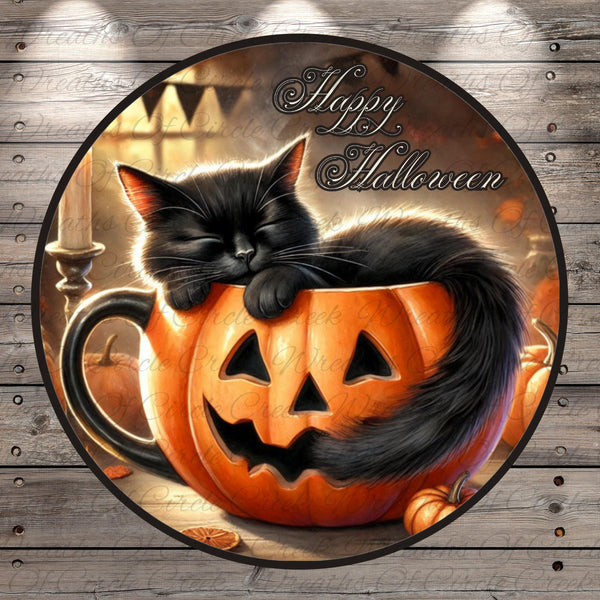 A black cat is curled up and sleeping inside a carved pumpkin, surrounded by other pumpkins and a candle, with the text "Happy Halloween" displayed above the pumpkin.
