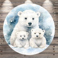 A family of three polar bears sitting together in a snowy winter scene, with a wooden background.
