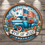 A circular wooden sign with a blue truck and American flag, surrounded by flowers and stars, celebrating the 4th of July.